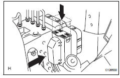 Toyota RAV4. Install abs and traction actuator assembly with bracket