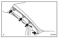 Toyota RAV4. Using a clip remover, remove the 4 wiring harness clamps.