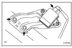 Toyota RAV4. Remove yaw rate sensor assembly