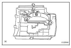 Toyota RAV4. Remove position indicator light housing