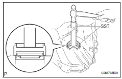 Toyota RAV4. Install differential side bearing retainer oil seal