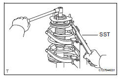 Toyota RAV4. Remove front support to front shock absorber nut