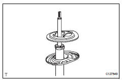 Toyota RAV4. Install front coil spring insulator lower lh