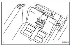 Toyota RAV4. Remove stereo jack adapter assembly