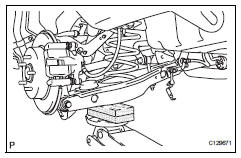 Toyota RAV4. Disconnect rear suspension no. 2 Arm subassembly lh