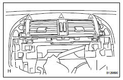 Toyota RAV4. Remove instrument panel register assembly center