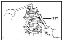 Toyota RAV4. Install front support to front shock absorber nut