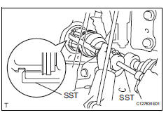 Toyota RAV4. Remove front drive shaft assembly lh