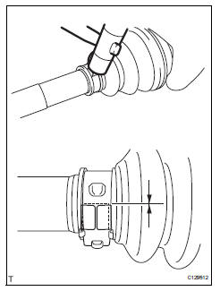 Toyota RAV4. Install front axle outboard joint boot clamp