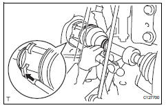 Toyota RAV4. Install front drive shaft assembly lh