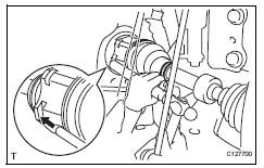 Toyota RAV4. Install front drive shaft assembly lh