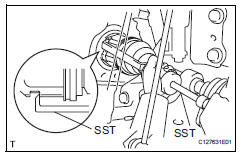 Toyota RAV4. Remove front drive shaft assembly lh