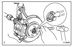 Toyota RAV4. Install front axle hub nut