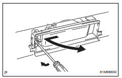 Toyota RAV4. Remove license plate light assembly