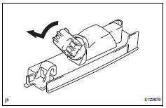 Toyota RAV4. Remove license plate light bulb