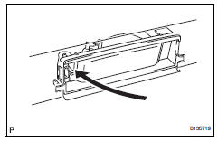 Toyota RAV4. Install license plate light assembly