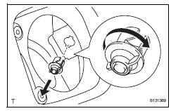 Toyota RAV4. Remove fuel filler opening lid lock retainer