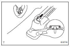 Toyota RAV4. Remove front seat track bracket outer cover lh