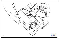 Toyota RAV4. Remove rear seat center armrest cover