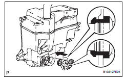 Toyota RAV4. Install windshield washer motor and pump assembly