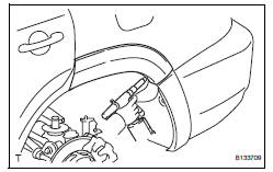 Toyota RAV4. Install rear quarter outside moulding lh