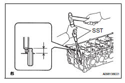 Toyota RAV4. Replace intake valve guide bush