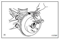 Toyota RAV4. Remove rear disc brake cylinder mounting lh