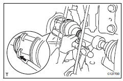 Toyota RAV4. Install front drive shaft assembly lh